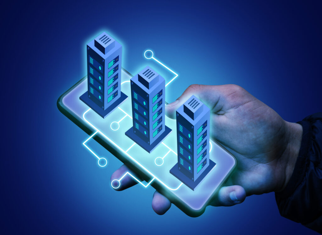 Man holding smartphone with apartment buildings hologram